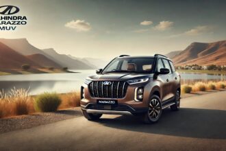 Mahindra Marazzo एक खूबसूरत प्राकृतिक स्थान पर खड़ी है, जिसमें स्टाइलिश फ्रंट ग्रिल, एलईडी हेडलाइट्स और प्रीमियम लग्जरी इंटीरियर नजर आ रहा है। बैकग्राउंड में सुरम्य पहाड़ियां और साफ नीला आसमान दिख रहा है, जो इसे लॉन्ग ड्राइव और फैमिली ट्रिप के लिए एक बेहतरीन फोर-व्हीलर बनाता है।