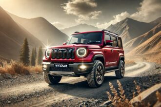 2025 Mahindra Thar 5-Door, दमदार 2.2L इंजन और 7-सीटर वेरिएंट के साथ, एक स्टाइलिश ऑफ-रोड SUV है। इसमें बोल्ड फ्रंट ग्रिल, LED हेडलाइट्स, बड़े ऑल-टेरेन टायर्स और एडवेंचर-रेडी डिज़ाइन दिखाया गया है, जो इसे ऑफ-रोडिंग और फैमिली यूज के लिए परफेक्ट बनाता है।
