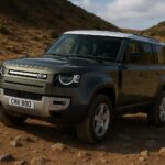 Land Rover Defender SUV in rugged terrain